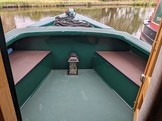 Bow deck with cushioned seating